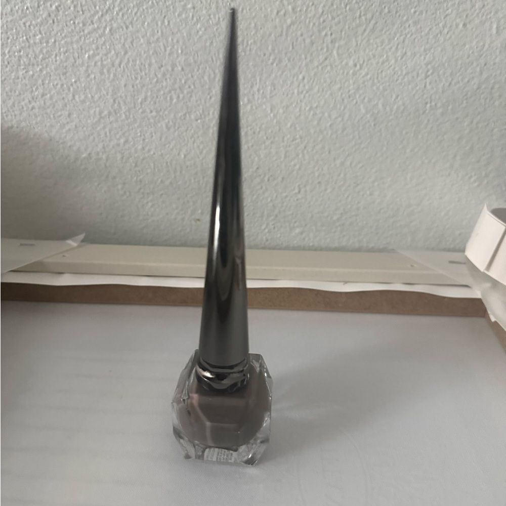Brand new Christian Louboutin Gray Nail Polish